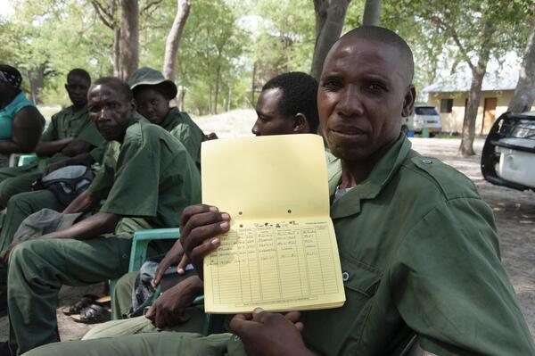 Game guard from Balyerwa showing his Event Book 