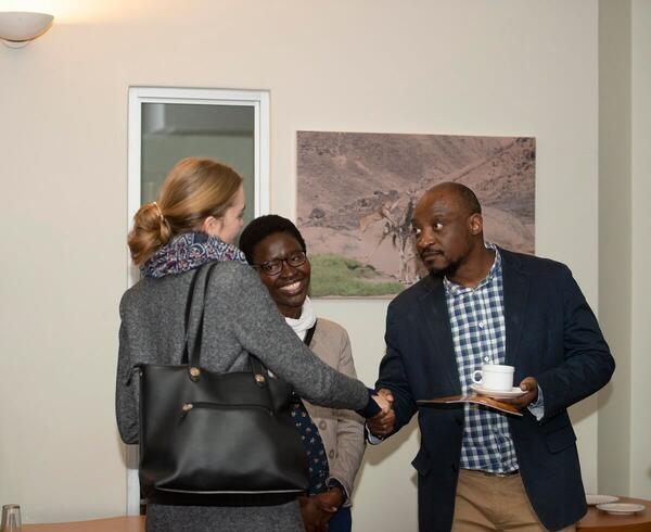 Business Consultant, Isack Lungu, exchange greatings with Nuria Stroermer from KfW